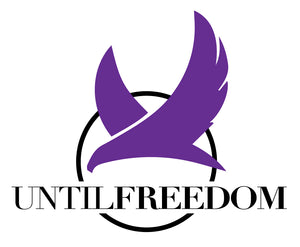 Black Cicle with a purple bird soaring through it. The words Until Freedom  capitalized across the bottom of the circle.